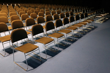 Endless rows of chairs in a modern conference hall