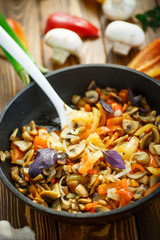 fried mushrooms with peppers and onions
