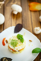 layered salad with mushrooms and vegetables