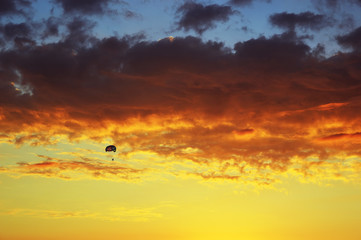 Para sailing on the background of beautiful sunset