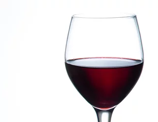 Fotobehang glass of red wine © naruedom