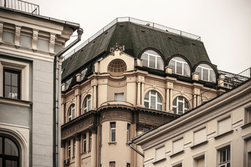 Fragment of the house with pillars and bas-relief horizontal