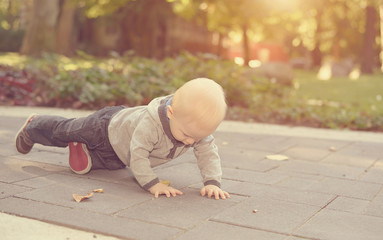 Adorable baby work out in the park
