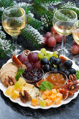 appetizers to the holiday - cheeses, fruits and jams, vertical