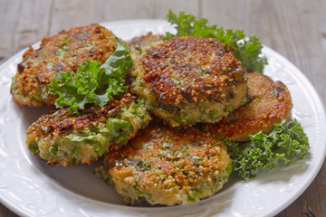 Quinoa fritters with kale and cheddar