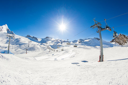 Piste slope at sun day.