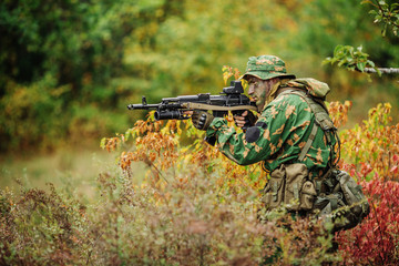 russian soldier in the battlefield with a rifle