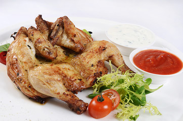 The baked hen with salad close-up