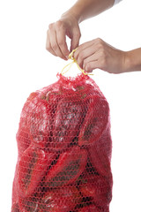 Red peppers in a sack