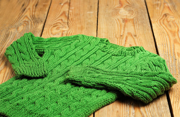 Fototapeta premium Baby boy green sweater