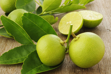 lime fruit on wooden background