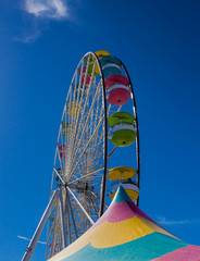 Ferris Wheel against blue sky at a Carnival