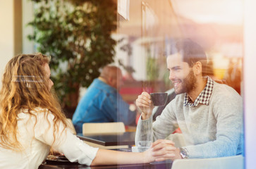 Young couple in cafe