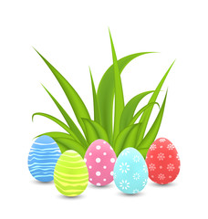 Traditional colorful ornamental eggs with grass for  Easter