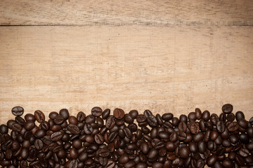 coffee beans on wood background