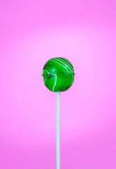 Lollipop shaped round on a pink background