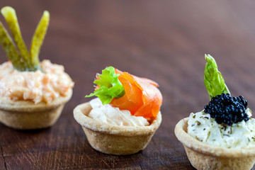 Mini tartlets with savory filling.