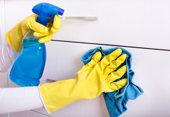 Woman cleaning drawers