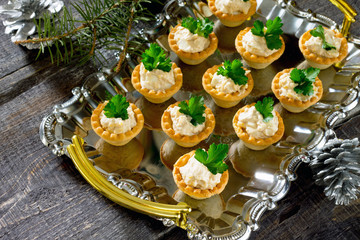 Tartlets with cod liver mousse on New Year's Eve