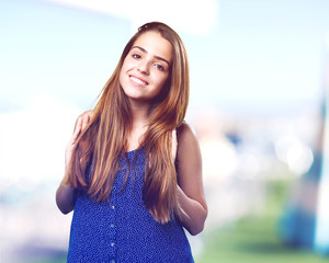 young cute woman smiling on a white background