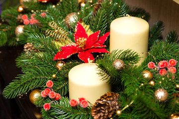 Two candles in the decoration of the Christmas tree