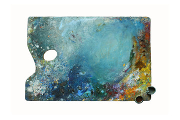 Artistic palette with oil paints - isolated object