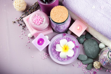 Obraz na płótnie Canvas Spa treatments on colorful background. Lavender spa concept