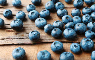 Fresh blueberries on wooden table, closeup