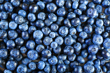 Heap of tasty ripe blueberries close up