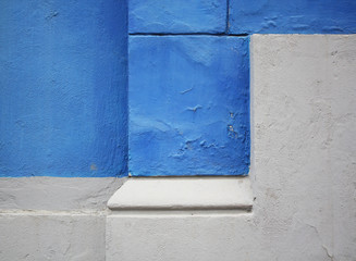 Blue and gray plaster wall texture.