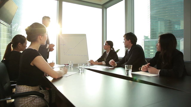 young businessman making a presentation of a business plan in