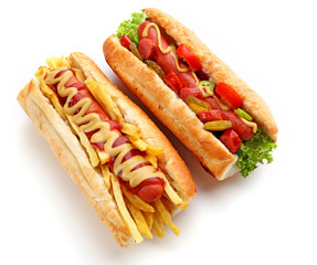 A pair of fresh hot dogs isolated on white