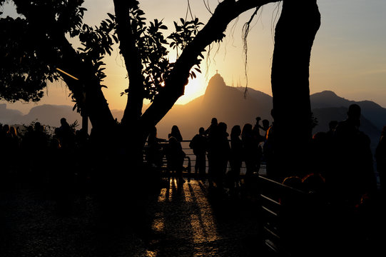 Tourists enjoy the scenery of Christ the Redeemer in Urca