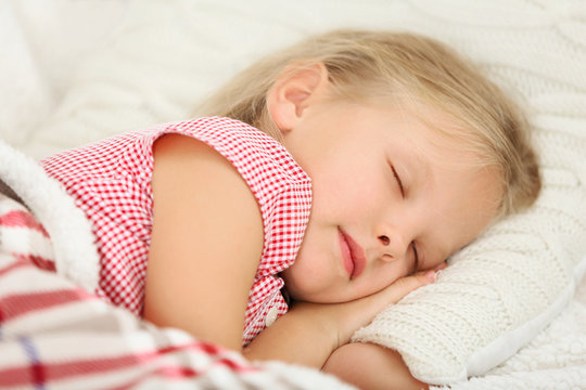 Sleeping little girl closeup