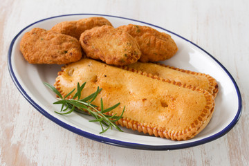 typical portuguese appetizers on white dish on white background