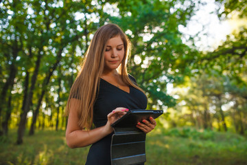 Girl European appearance young brown-haired woman in a black dre