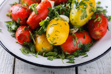 Salted tomatoes.Appetizer.selective focus