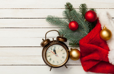Fototapeta na wymiar Alalrm-clock and Christmas baubles