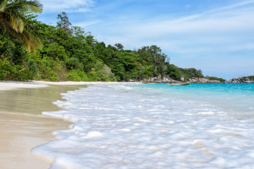 Beautiful nature of blue sea sand and white waves on the beach during summer at Koh Miang island in Mu Ko Similan National Park, Phang Nga province, Thailand
