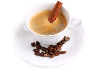 coffee with cinnamon ceramic cup and saucer grains isolated on a white background
