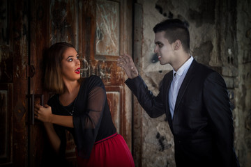 Beautiful young woman trying to escape from the vampire