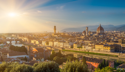 Fototapeta na wymiar Sunset view of Florence, Ponte Vecchio and Duomo. Italy