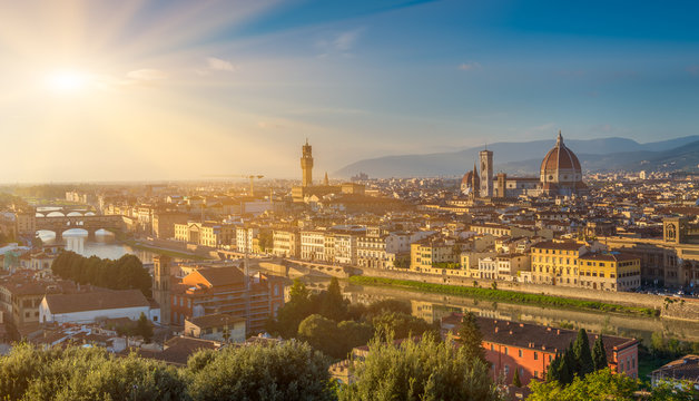 Sunset view of Florence, Ponte Vecchio and Duomo. Italy