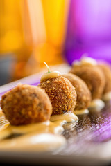 fried meatballs with sauce