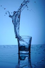 Splashes of water from glass