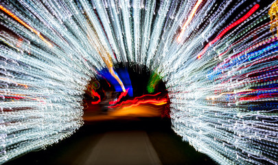 Christmas light tunnel given the effect of passing through at high speed