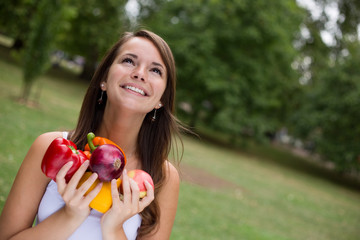 happy young woman holding food