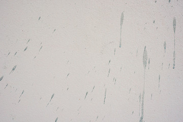 Pink wall texture and lime stains