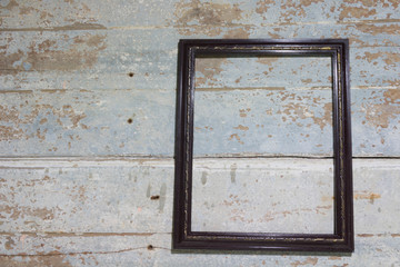 Classic wooden frame on old wooden background