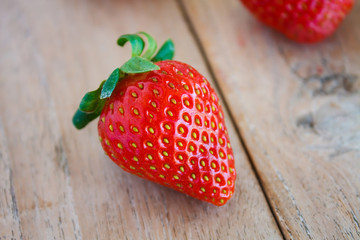 Fresh strawberries on wooden table